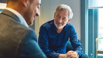 Two male colleagues in a meeting